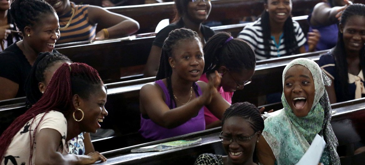 Students laugh during a class lecture at the University of Ghana in Accra. World Bank/Dominic Chavez