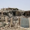 Des maisons détruites par des frappes aériennes dans la capitale Sana'a, au Yémen, en juillet 2015. Photo OCHA/Charlotte Cans