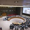 File photo of a wide view of the Security Council, being briefed via video conference by Zahir Tanin (on screen), Head of the UN Interim Administration Mission in Kosovo (UNMIK).