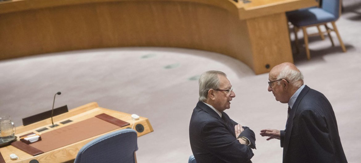 Judge Carmel Agius, (left) President of the International Criminal Tribunal for the Former Yugoslavia, speaks with Judge Theodor Meron (right), President of the International Residual Mechanism for Criminal Tribunals, in the Security Council Chamber.