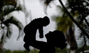 In Recife, Brazil, a 15-year-old mother holds her 4-month-old baby born with microcephaly, caused by the Zika virus.