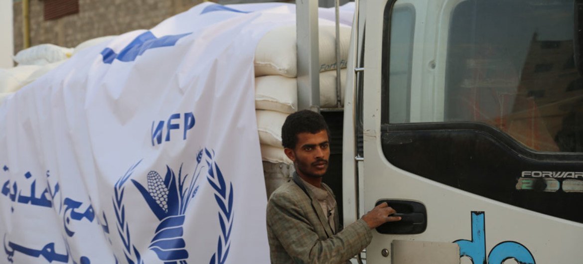 WFP trucks loaded with wheat grain, oil and salt are ready to leave for Amran, a hundred kilometres north of Yemen’s capital, Sana'a.
