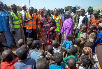 Special Representative of the Secretary-General for Children and Armed Conflict Leila Zerrougui (centre), meets displaced children and their families in northeastern Nigeria, in January 2015.
