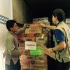 Loading trucks with WFP food for the quake-stricken town of Pedernales in Ecuador.