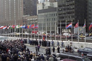 A view of the flag raising ceremony in March 1992 for the nine countries - Moldova, Kazakhstan, Kyrgyzstan, Azerbaijan, Uzbekistan, Tajikistan, Turkmenistan, Armenia and San Marino - admitted to the United Nations.