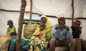 At Ndutu refugee camp in Tanzania, Abdul Yamuremye in his tent with his wife Hadija Umugure and their family fled violence in Burundi after their house had been attacked killing Abdul's two brothers, a friend who stayed with them and her three children.