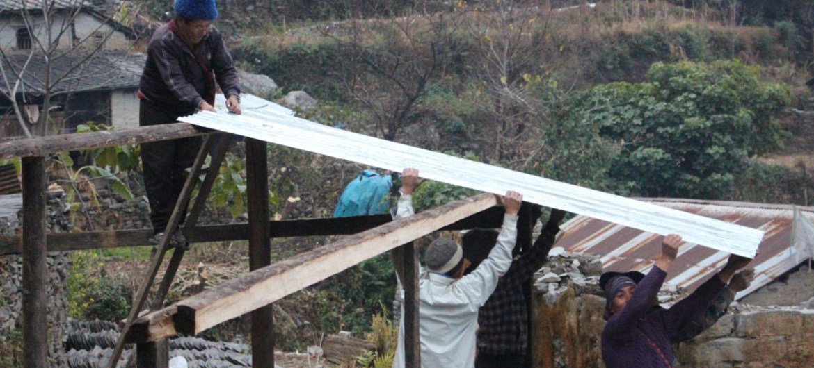 Corrugated iron sheets being used to create household shelter to protect survivors of the April 2015 earthquake in Nepal.