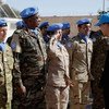 Secretary-General Ban Ki-moon (right) greets peacekeepers on 5 March 2016 during a military ceremony at the United Nations Mission for the Referendum in Western Sahara (MINURSO) Bir Lahlou site.