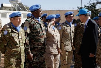 Secretary-General Ban Ki-moon (right) greets peacekeepers on 5 March 2016 during a military ceremony at the United Nations Mission for the Referendum in Western Sahara (MINURSO) Bir Lahlou site.