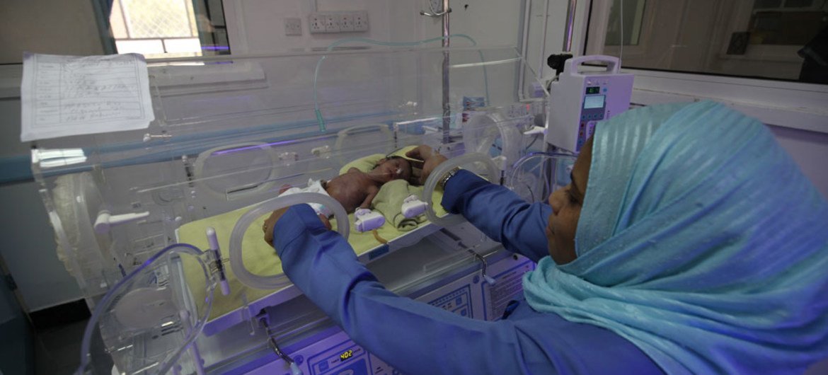 A nurse taking care of an infant child in an incubator at the Al-Sabeen Hospital in Sana’a. Hospitals and clinics in Yemen have been paralyzed by the war: they have either been attacked, run out of medical supplies and fuel or the medical staff have been forced to flee.