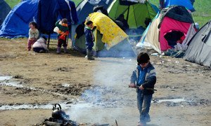 Children outside refugee tents on 8 March 2016, in Idomeni, Greece.