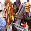 New arrivals queuing for tent allocation at Dadaab Refugee Camp's Ifo Extension site in July 2011.
