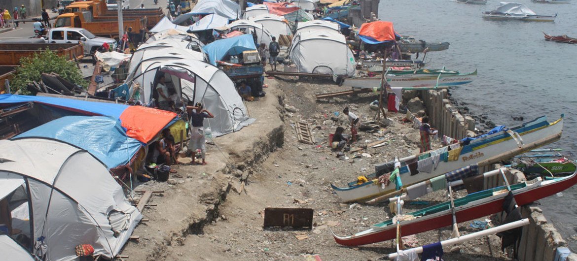 The coastal city of Zamboanga in the Philippines is vulnerable to climate related hazards. Displaced people sheltering in tents near the coast are more at risk of other natural hazards if they stay longer in the area.