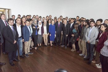 Secretary-General Ban Ki-moon and his wife Yoo Soon-taek (centre), meeting with Syrian students in Lisbon, Portugal.