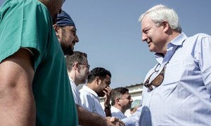 Under-Secretary-General for Humanitarian Affairs Stephen O’Brien (right), meeting medical personnel in Hatay, Turkey, which borders Syria.