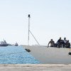 在地中海被救援的难民和移民抵达西西里岛。(资料)