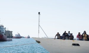 Refugees and migrants rescued at sea by the Italian coast guards after adrift in the Mediterranean Sea disembarked at the port of Augusta in Sicily, May 2016.