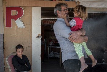 A displaced family from Mosul living at Baharka Camp on the outskirts of Erbil, Iraq.