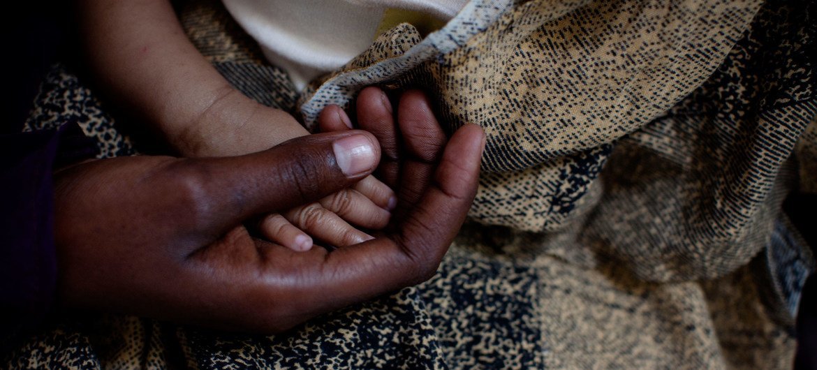 Sixteen-year-old Fatima and her newborn in a shelter for girls and women who have endured sexual and gender-based violence, in Mogadishu, Somalia.