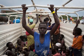 Refugees from South Sudan are transported from Elego town to the Numanzi Transit Center where meals and temporary accommodation are provided by UNHCR in Adjumani, northern Uganda.