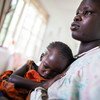 受到南苏丹危机影响的一名朱巴妇女和她的孩子。儿基会/Albert González Farran