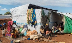 Families displaced by ongoing fighting seek shelter in the UN Protection of Civilians site in Wau, South Sudan.