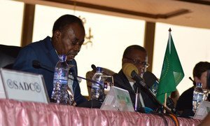 African Union facilitator Edem Kodjo (left) addresses the meeting of the preparatory committee to the national dialogue in the Democratic Repiblic of the Congo (DRC).