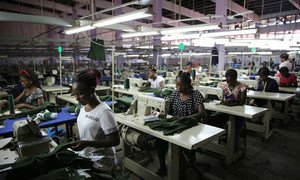 Young factory workers producing shirts in Accra, Ghana. 