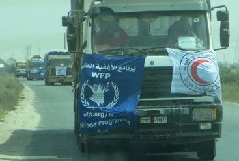 A convoy with essential humanitarian supplies for 75,000 people enters the Al Waer neighbourhood of Homs, Syria, on 25 August 2016.