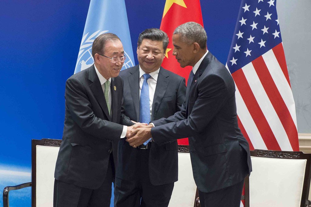 United Nations Secretary-General Ban Ki-moon shakes hands with China’s President Xi Jinping and United States President Barack Obama at a climate pact ratification ceremony in Hangzhou, China, on 3 September 2016. China and the US deposited their legal in