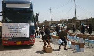 WFP distributes desperately needed food for more than 30,000 people in Qayyarah.