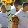 巴西残奥会运动员参加里约奥运火炬接力活动。