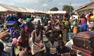 South Sudanese refugees arrive at the Elegu border collection point in Adjumani district, northern Uganda.