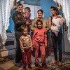 A family at home in a Roma settlement in Belgrade, Serbia (file)