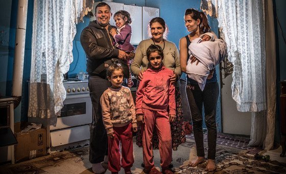 A family at home in a Roma settlement in Belgrade, Serbia (file)