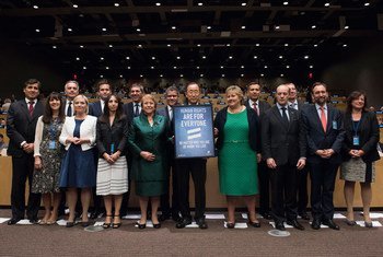 Secretary-General Ban Ki-moon (center) in a group photo with participants at the high-level side event of the lesbian, gay, bisexual and transgender (LGBT) Core Group "Path2Equality: Global leaders discuss progress towards LGBT Equality".