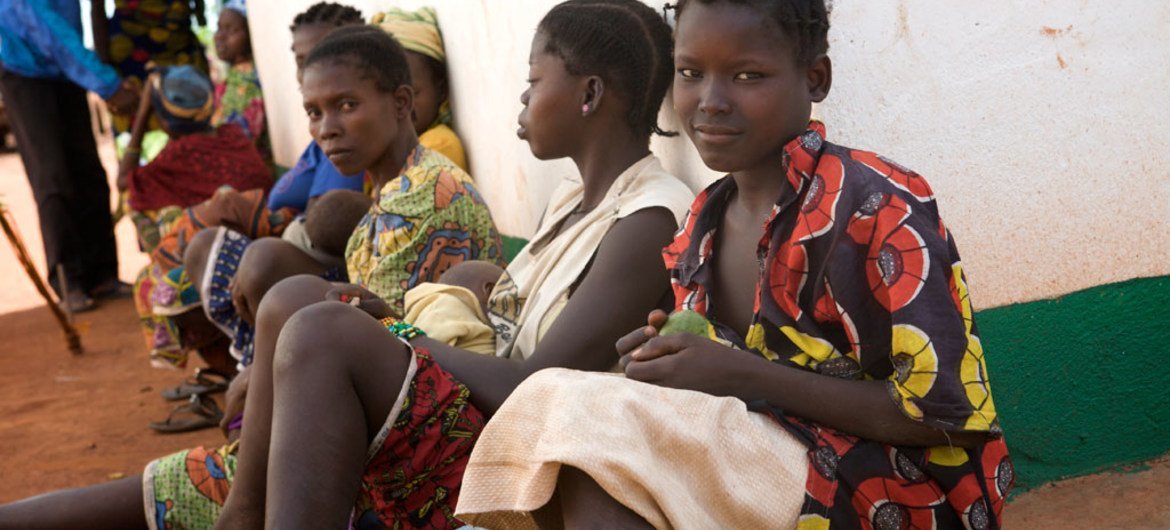 Women and children waiting in front of a health post in Kaga- Bandoro, north-western Central African Republic (CAR).