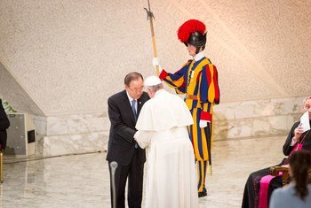 Secretary-General Ban Ki-moon (left) with Pope Francis during the opening ceremony of the Vatican conference on “Sport at the Service of Humanity.”