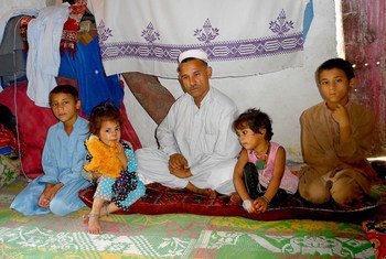 A family in the Kababiyan camp for Afghan refugees in Peshawar, Pakistan.