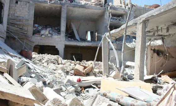 Destruição no campo de Yarmouk, na Síria.