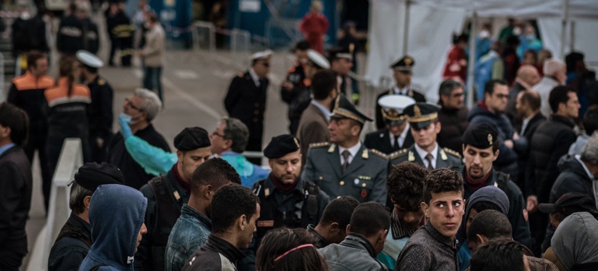 Refugees and migrants disembark a Spanish coast guard vessel at the port of Palermo, Sicily, Italy on 13 May 2016. In 2015, Italy received 150,000 asylum-seekers, and the country is on track to receive a higher number in 2016.