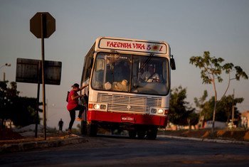 A bus stops for a passenger on a street in Taiobeiras municipality in the southeastern state of Minas Gerais, Brazil.