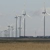 At the flat Wadden Sea coast in the German state of Schleswig-Holstein, the threat of sea level rise and attempts to mitigate climate change by producing renewable energy can be studied side by side. Wind power is a major source of electricity.