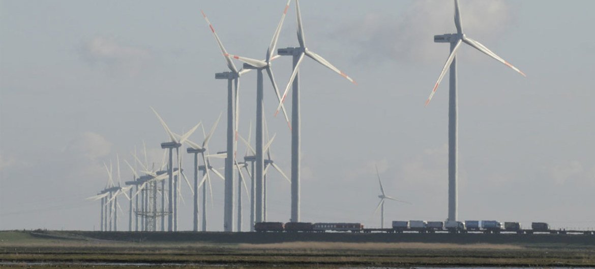 At the flat Wadden Sea coast in the German state of Schleswig-Holstein, the threat of sea level rise and attempts to mitigate climate change by producing renewable energy can be studied side by side. Wind power is a major source of electricity.