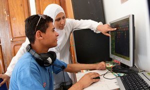 Innovators using a specialised computer.