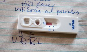A malaria testing kit on which solid red indicates a negative test result. Malaria is one of the most common causes of death for children under five in South Sudan.