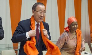 Secretary-General Ban Ki-moon (left) and Phumzile Mlambo-Ngcuka, Executive Director of UN Women during a special event entitled “Orange the World: Raise Money to end Violence against Women,” commemorating the International Day for the Elimination of Violence against Women (25 November).