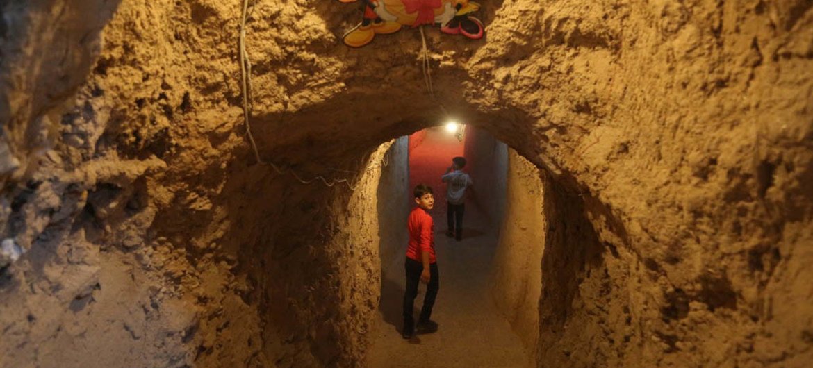 In Syria, Abdulaziz, 10, who lost his father during the war, comes to the 'Land of Childhood' underground playground to play and spend time with his friends.