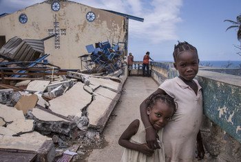 In Jérémie, Haiti, children play at the Église Chrétienne Nan Lindy. Hundreds of people have sought temporary shelter at the church after countless homes were destroyed by Hurricane Matthew.