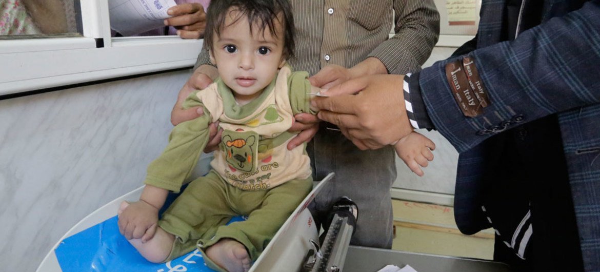 A baby is screened for malnutrition at the UNICEF-supported Al-Jomhouri Hospital in Sa’ada, Yemen.